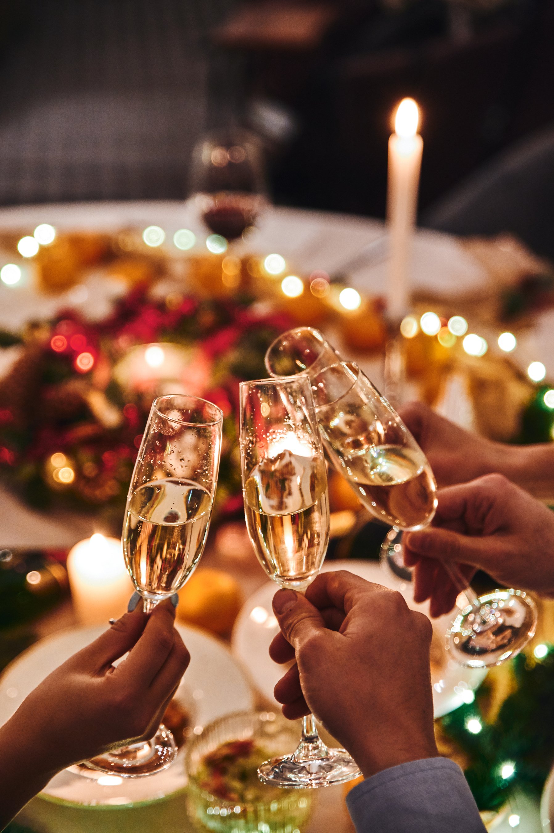 People Holding Glasses of Champagne